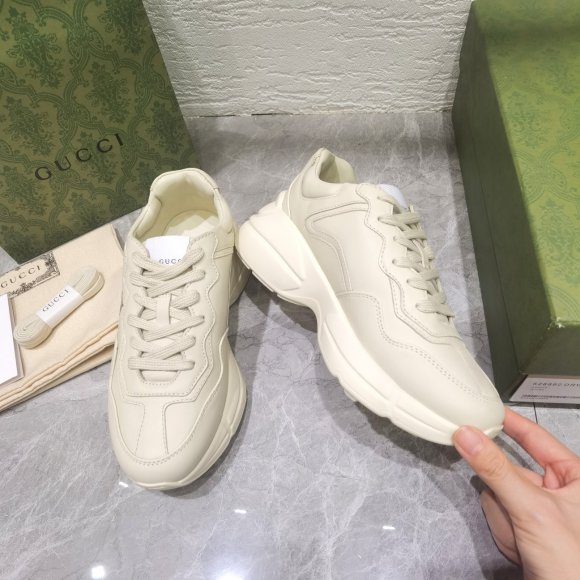 Gucci Rhyton Женские кроссовки MO_1409GU1W