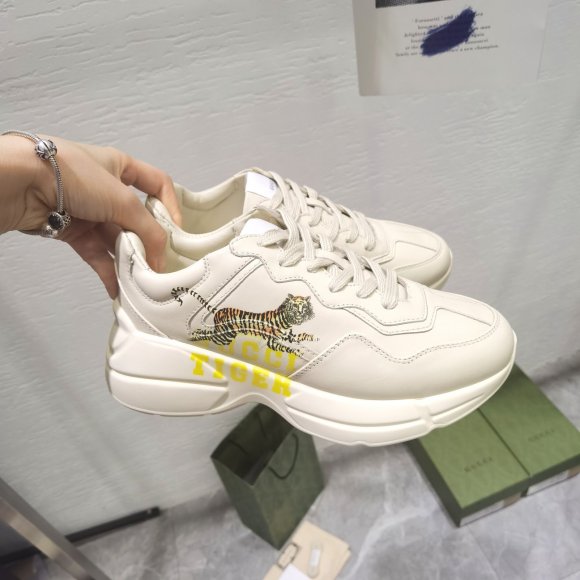 Gucci Rhyton Женские кроссовки MO_1409GU1W
