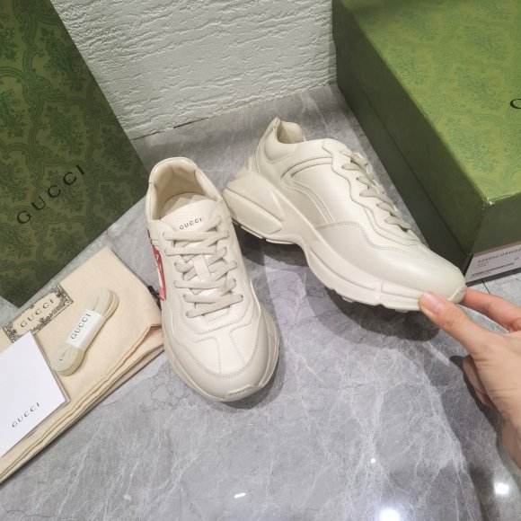 Gucci Rhyton Женские кроссовки MO_1409GU1W