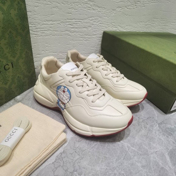 Gucci Rhyton Женские кроссовки MO_1409GU1W