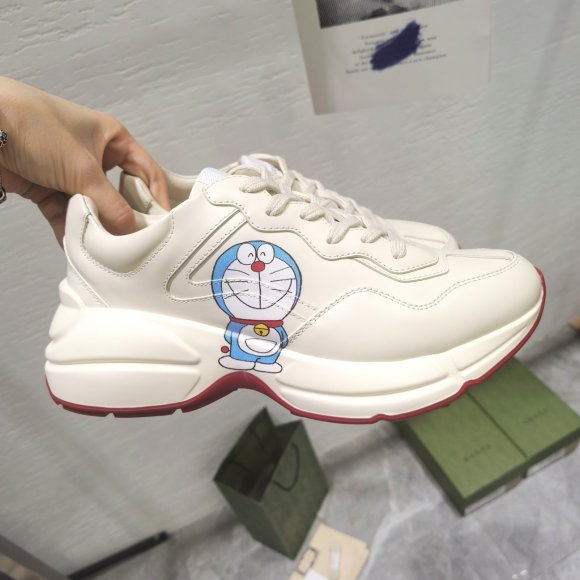 Gucci Rhyton Женские кроссовки MO_1409GU1W