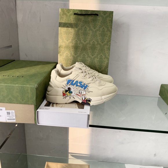 Gucci Rhyton Женские кроссовки MO_1509GU2W