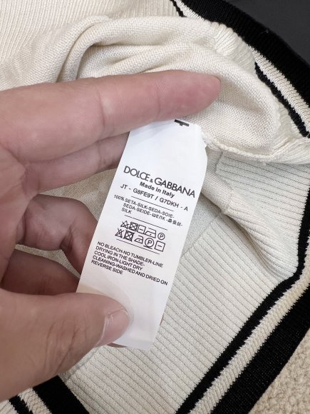 Dolce & Gabbana - Мужская шерстяная футболка поло DZ_1501DG9